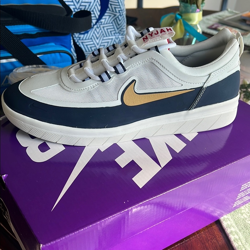 Nike White and Gold Sneakers Minimalist Design